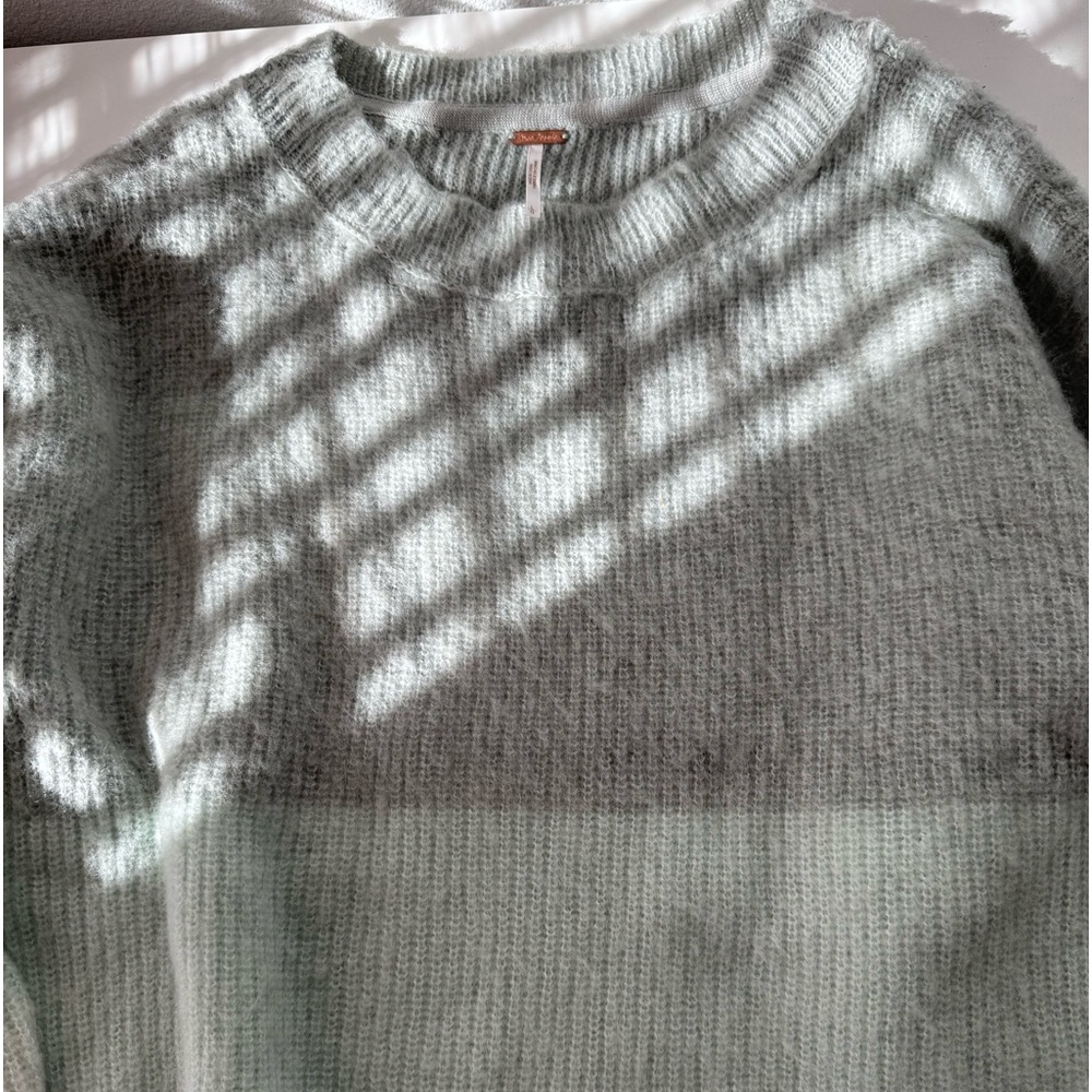 Free People sweater in large nylon and wool material.multi colored,new